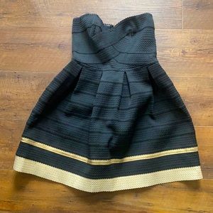 Sans Souci Small black and gold dress